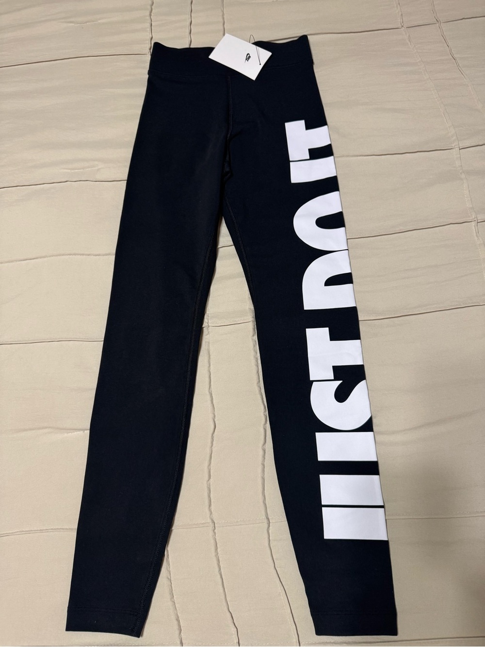 NWT-NIKE Women’s XSmall  Black Leggings with White Side Graphic